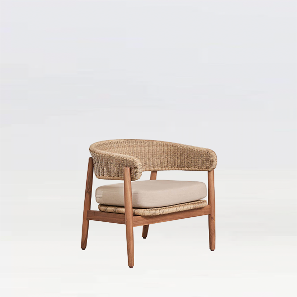 Drift Rattan armchair with cushion for hire furniture hire in London