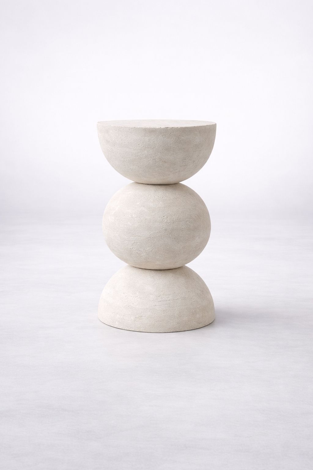 Three-tiered minimalist stone plinth, side table for hire London