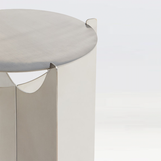 Chrome furniture for hire. Mirrored table for hire in London. Mirrored furniture. Chrome table for hire. close up image